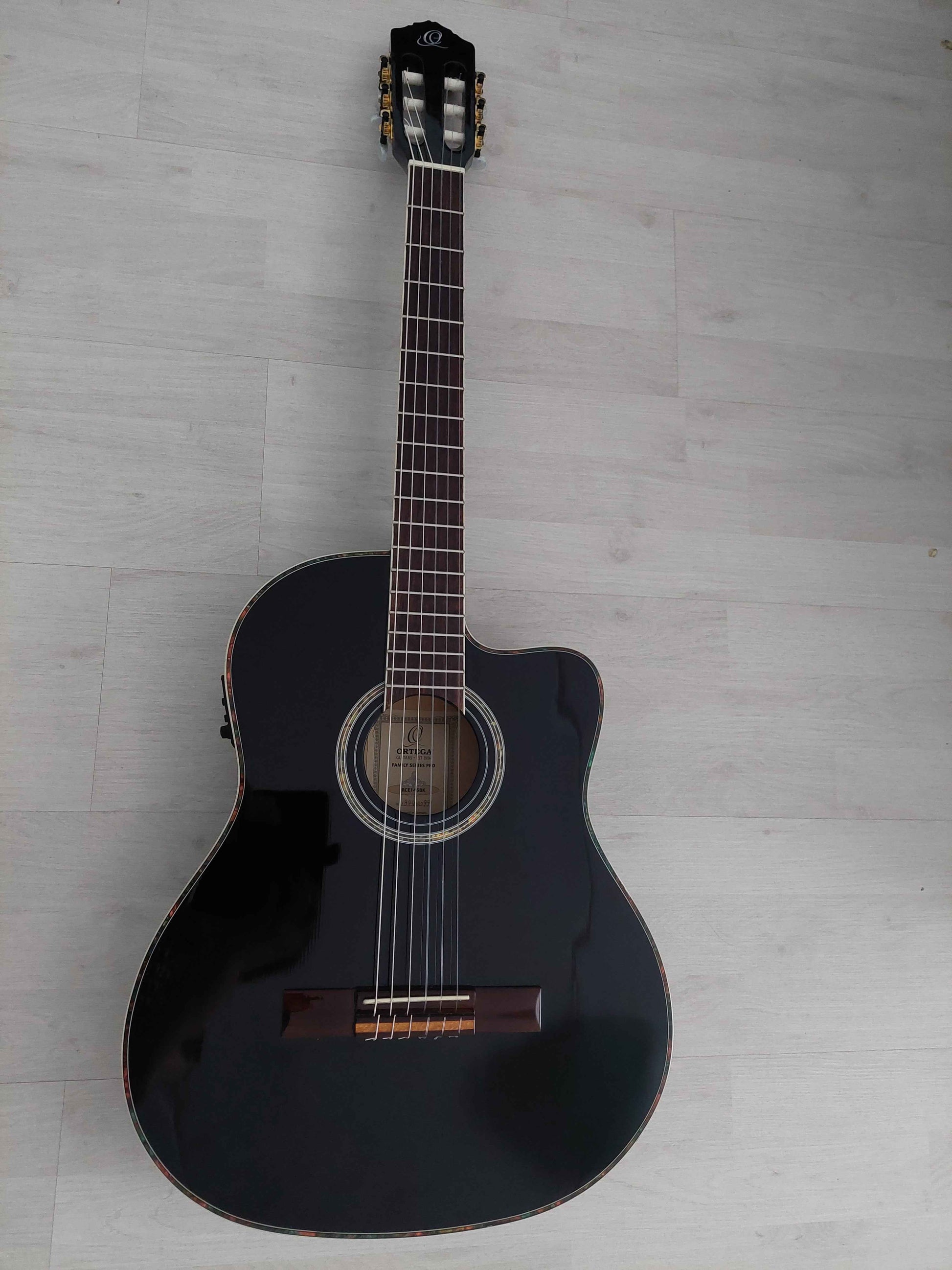 Ortega RCE145BK nylon string acoustic classical guitar cutaway with mic