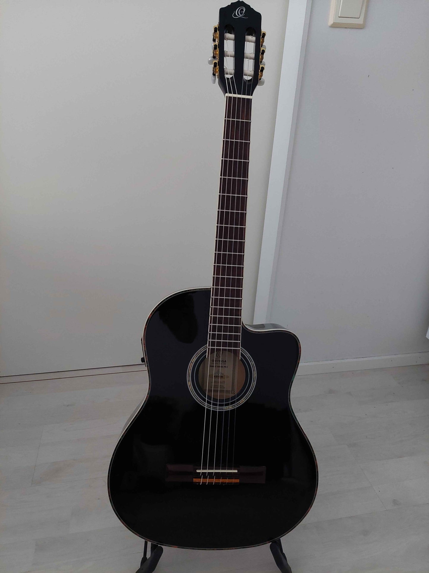 Ortega RCE145BK nylon string acoustic classical guitar cutaway with mic